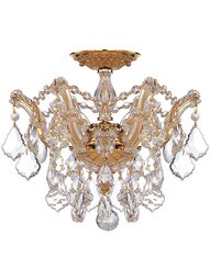 Maria Theresa Small Semi Flush Mount Draped in Clear Hand Cut Crystal in Polished Gold.